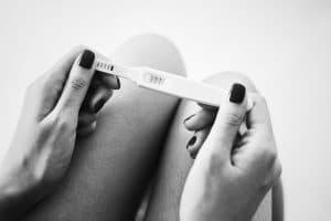 women doing a pregnancy test