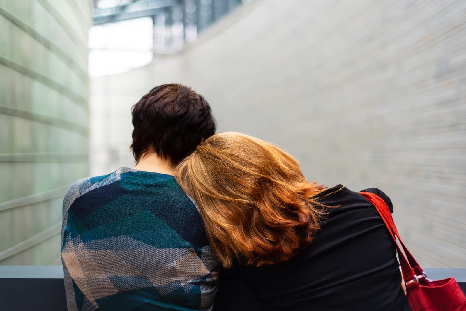 couple sitting together discussing fertility journey