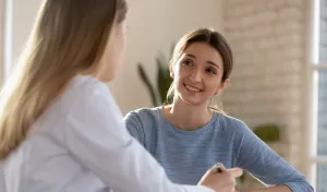 Discussing rebate options with Fertility First patient