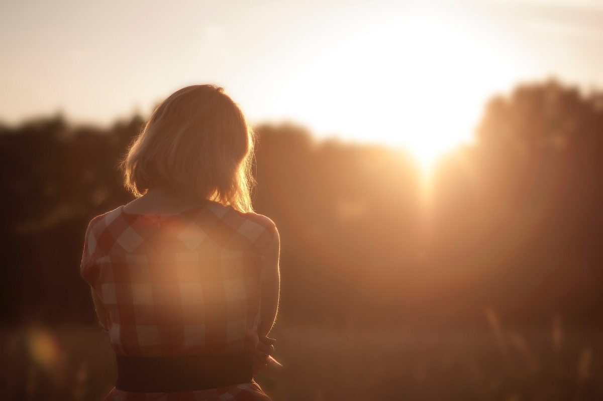 stock-unsplash-woman-sun-outside