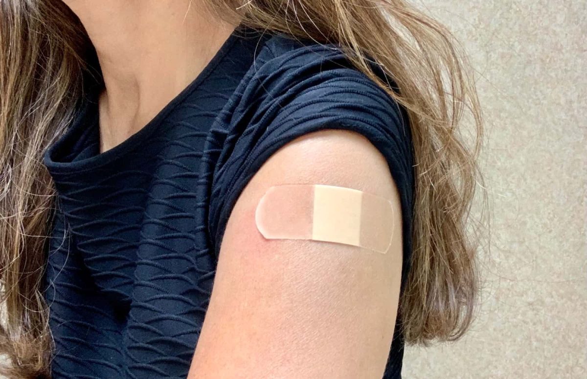 vaccination-bandaid-woman